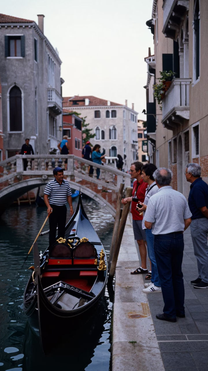 Venice Italy Early Evening Street Scene with Gondolier and Tourists in in Venice, Italy