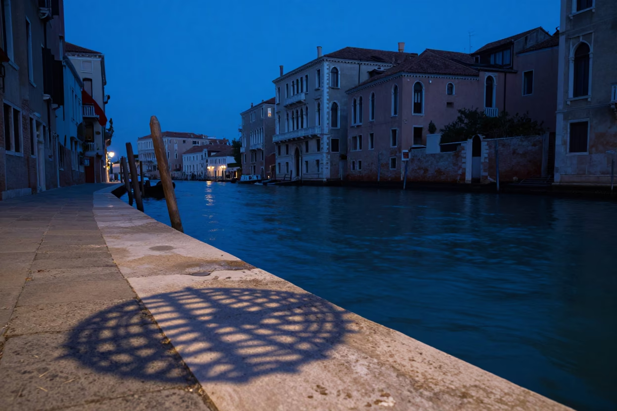 Venice Italy Evening Blue Hour Canal Scene with Wicker Shadow on Drain in in Venice, Italy