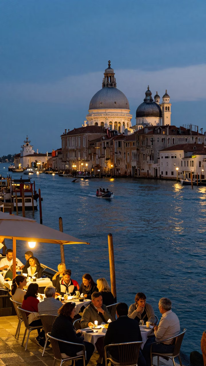 Venice Italy Evening Canal Scene with Local Diners and City Lights in in Venice, Italy