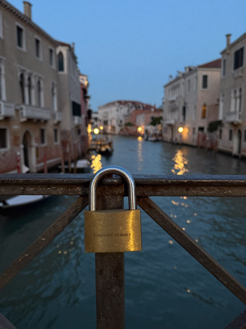 Venice Italy Evening Street Scene with Padlock on Railing and City Lights in in Venice, Italy