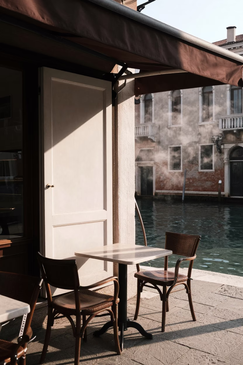Venice Italy Late Afternoon Canal Side Cafe Steam Haze and Local Conversation in in Venice, Italy