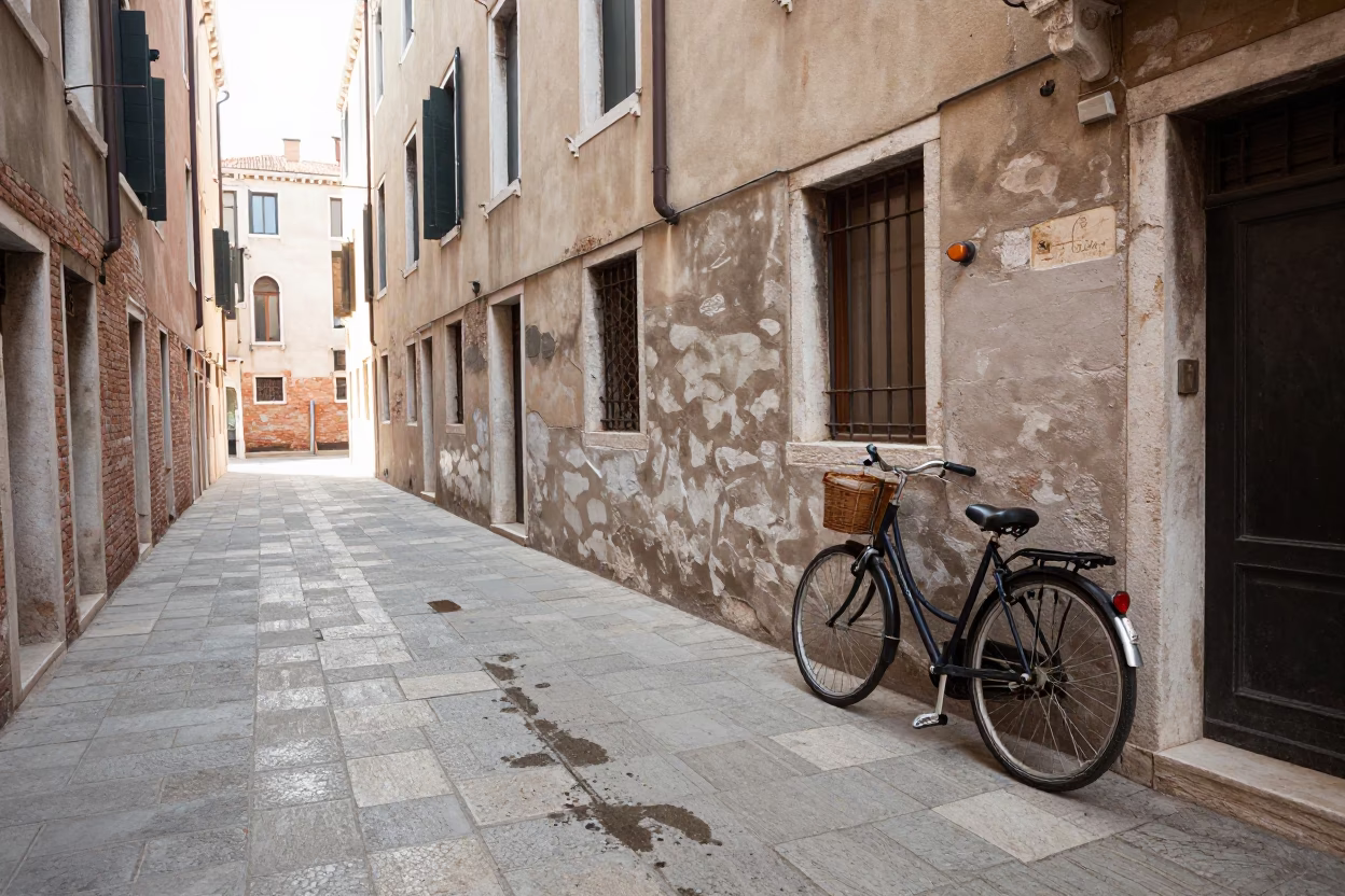 Venice Italy Late Morning Street Scene with Bicycle and Cafe Stool in in Venice, Italy