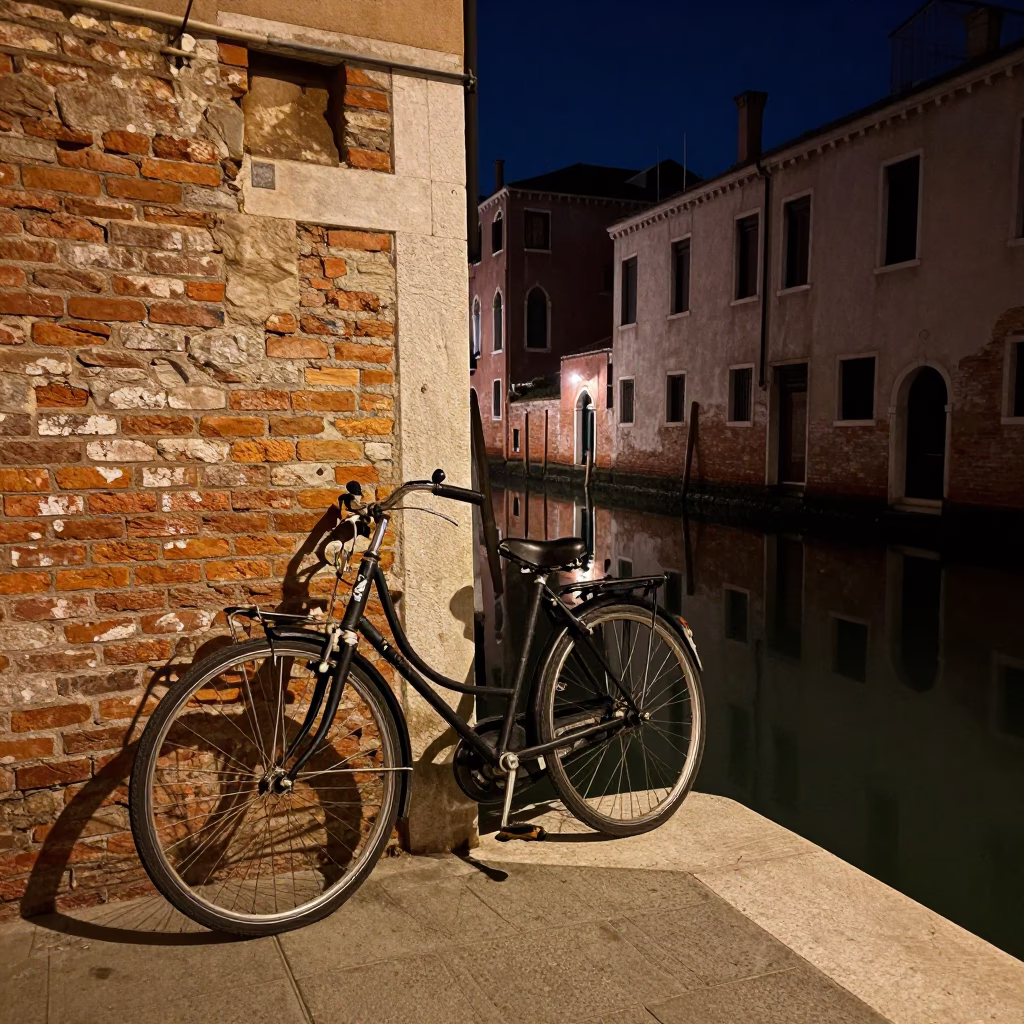 Venice Italy Night Canal Scene with Vintage Bicycle and Reflections in in Venice, Italy