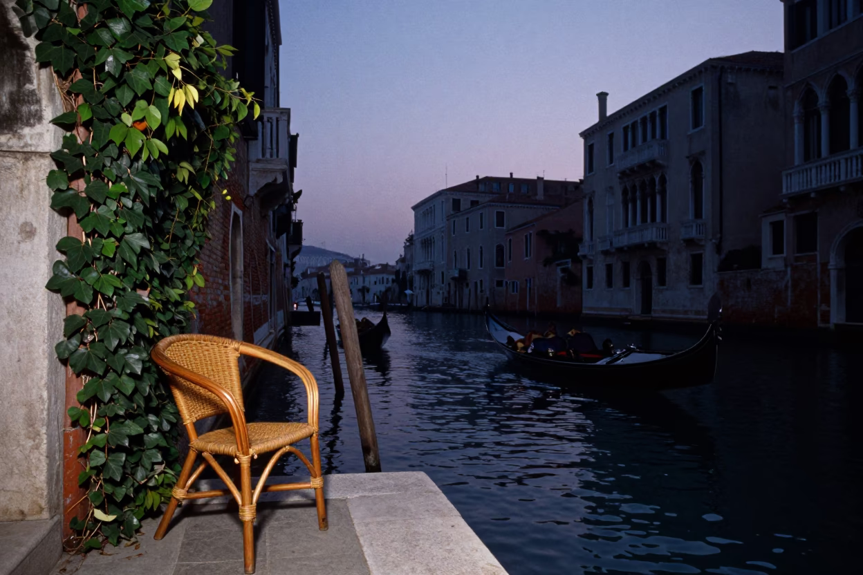 Venice Italy Pre-Dawn Canal Scene with Ivy and Rattan Chair in in Venice, Italy