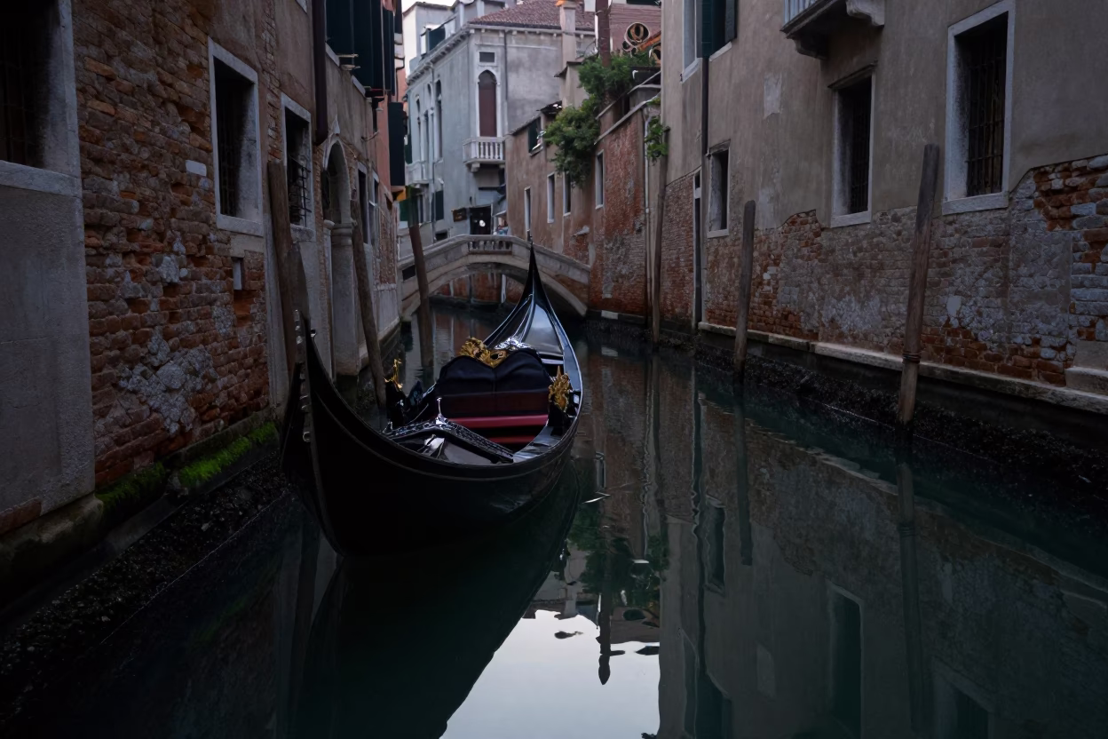 Venice Italy Predawn Gondola and Historic Canal Reflections in in Venice, Italy