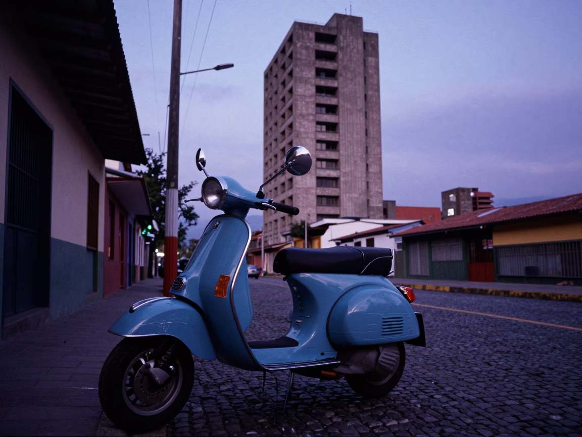 Vespa Parked in Medellin at Indigo Twilight After Sunset in in Medellin, Colombia