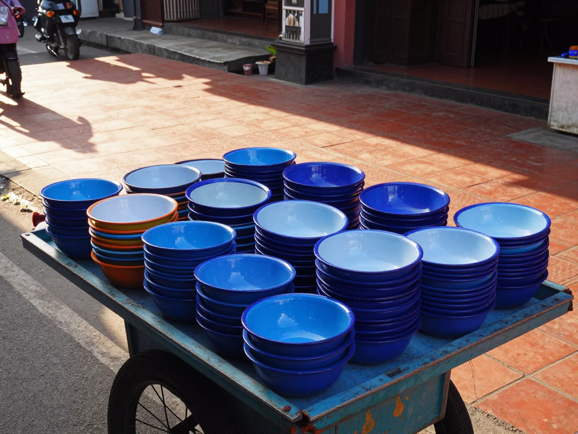 Vibrant Morning Street Scene in Yogyakarta Indonesia with Colorful Enamel Bowls in in Yogyakarta, Indonesia