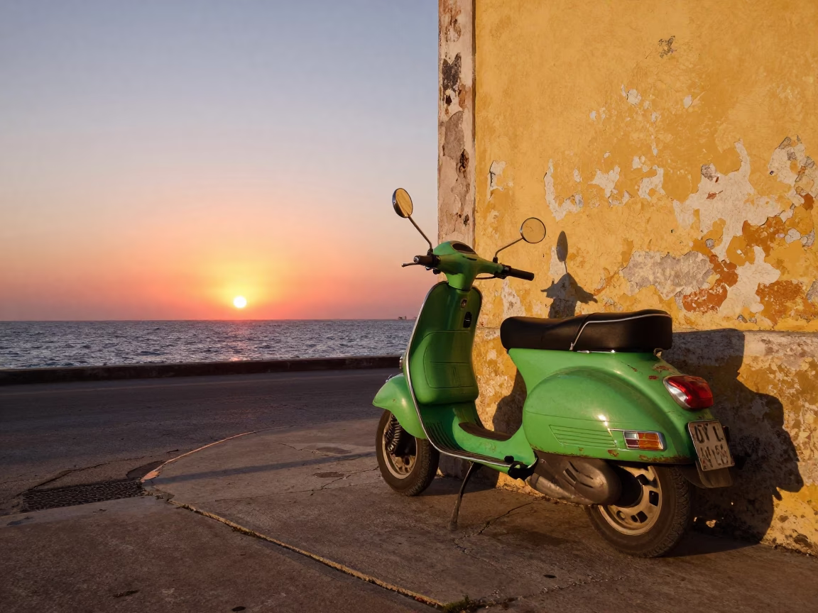 Vibrant Sunset Scene in Havana Cuba Featuring Vintage Scooter on Harbor Promenade in in Havana, Cuba