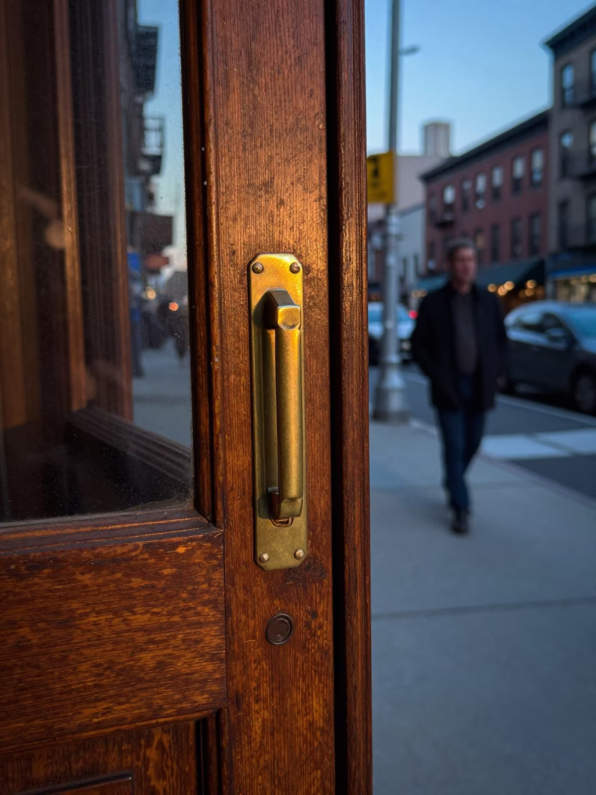 Vintage 1960s New York Street Scene with Polished Brass Latch and University Archway in in New York, New York, United States