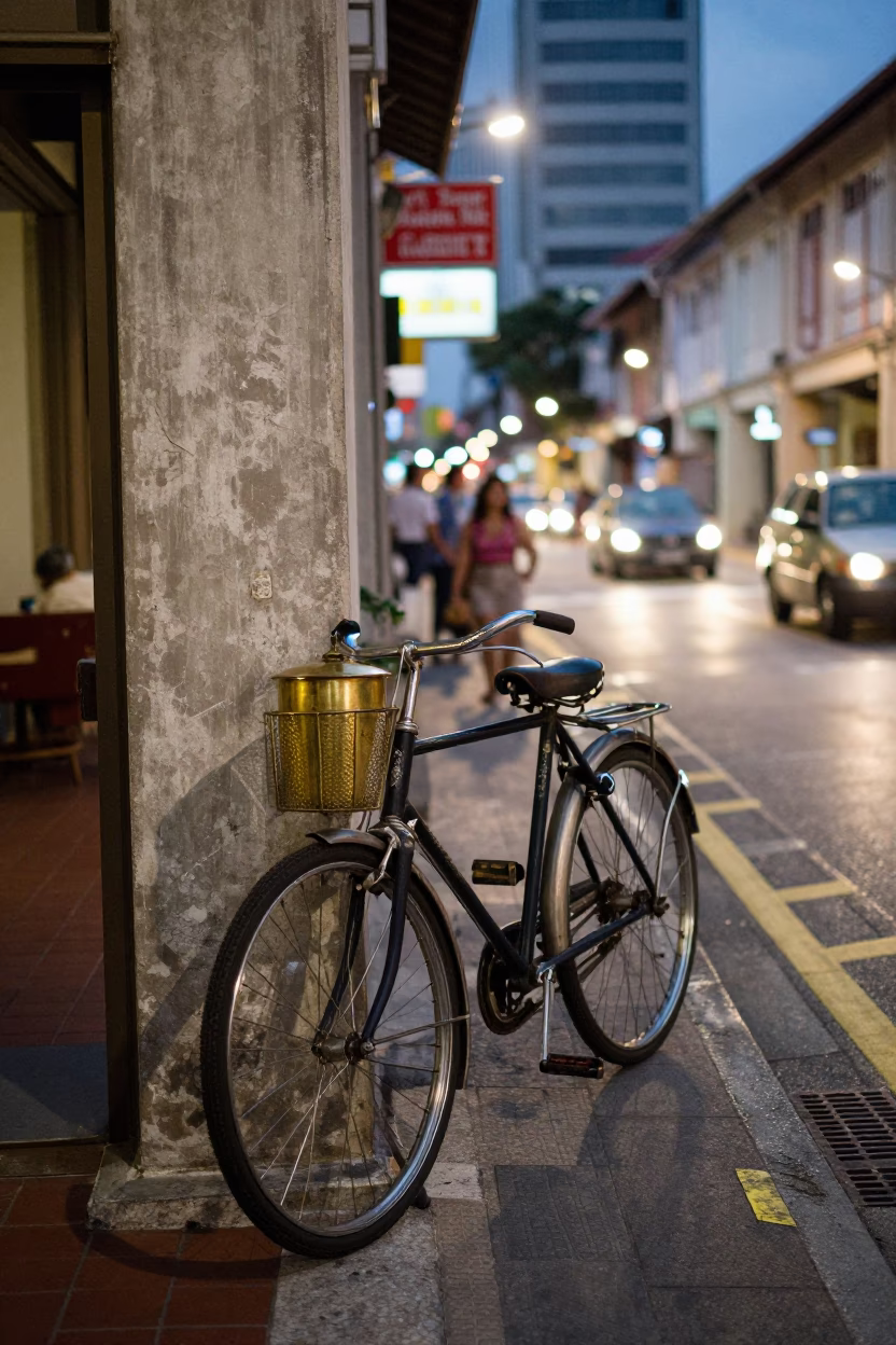 Vintage 1960s Singapore Street Scene with Bicycle and Brass Rail at Dusk in in Singapore, Singapore