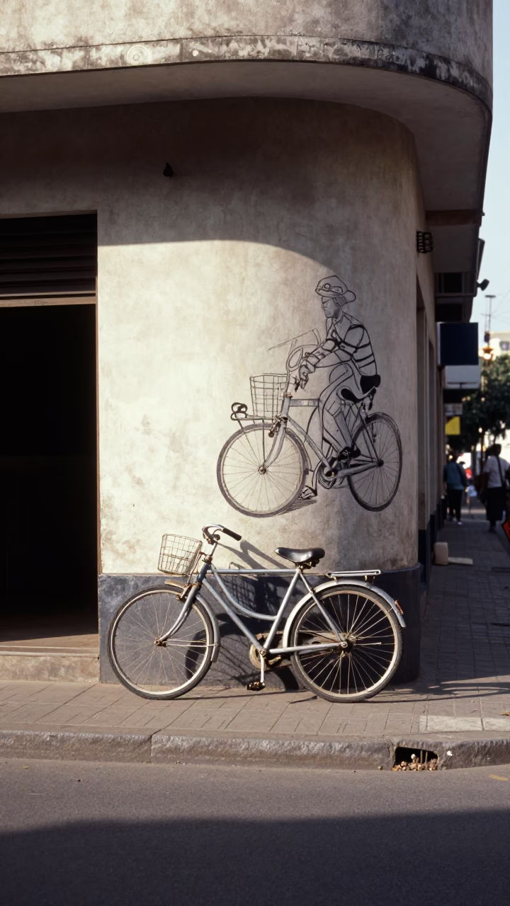 Vintage 1990s Johannesburg Street Scene with Bicycle and Art Deco Hotel Facade in in Johannesburg, South Africa