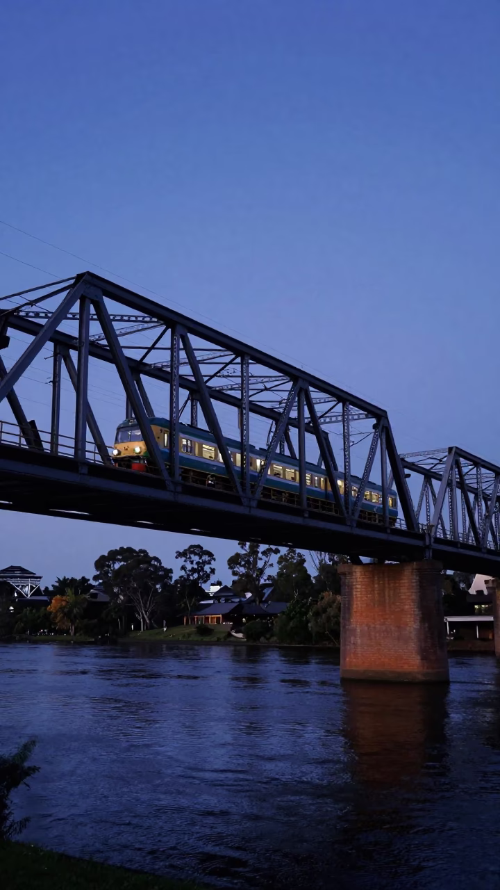 Vintage Adelaide Commuter Train Crossing Bridge at Blue Hour Before Dawn in in Adelaide, South Australia, Australia