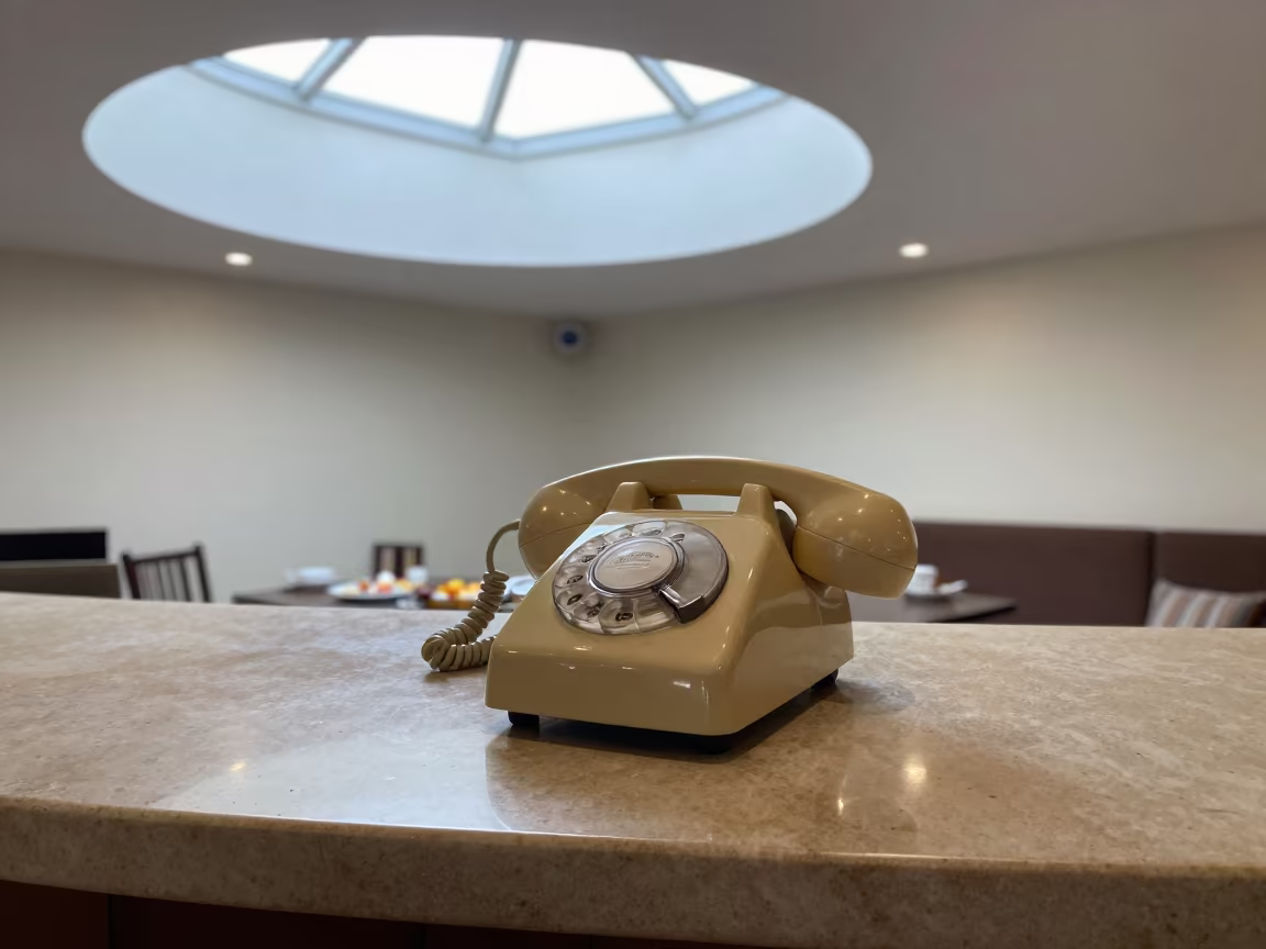 Vintage Bakelite Phone on Hotel Desk in inside a breakfast room before opening in Godavarikhani