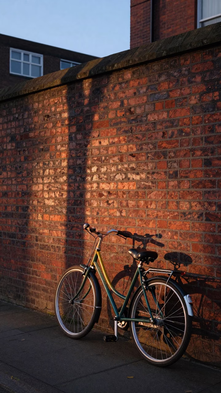 Vintage Bicycle Against Brick Wall in Liverpool Dawn Street Scene in in Liverpool, United Kingdom