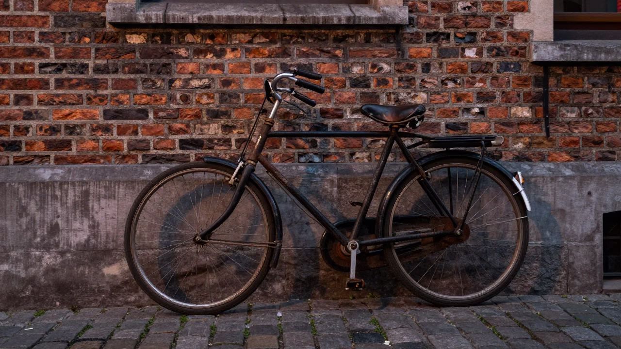 Vintage Bicycle Leaning Against Cobblestone Wall in Brussels Early Evening Street Scene in in Brussels, Belgium