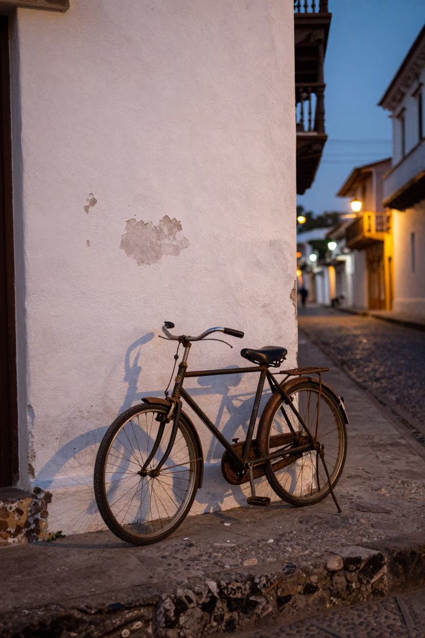 Vintage Bicycle Leaning Against Colonial Wall in Cartagena Colombia at Dusk in in Cartagena, Colombia