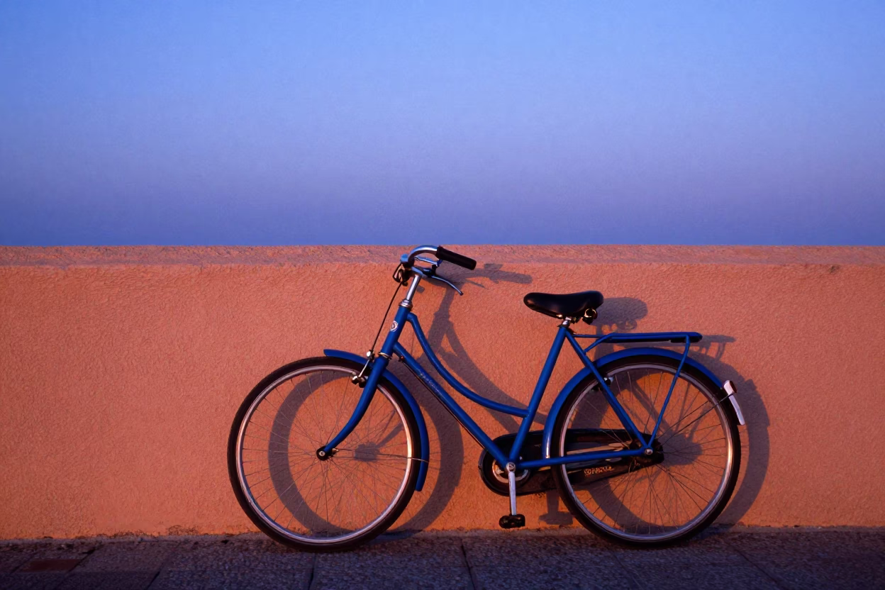 Vintage Bicycle Leaning Against Colorful Wall at Nautical Dawn in Madrid Spain in in Madrid, Spain