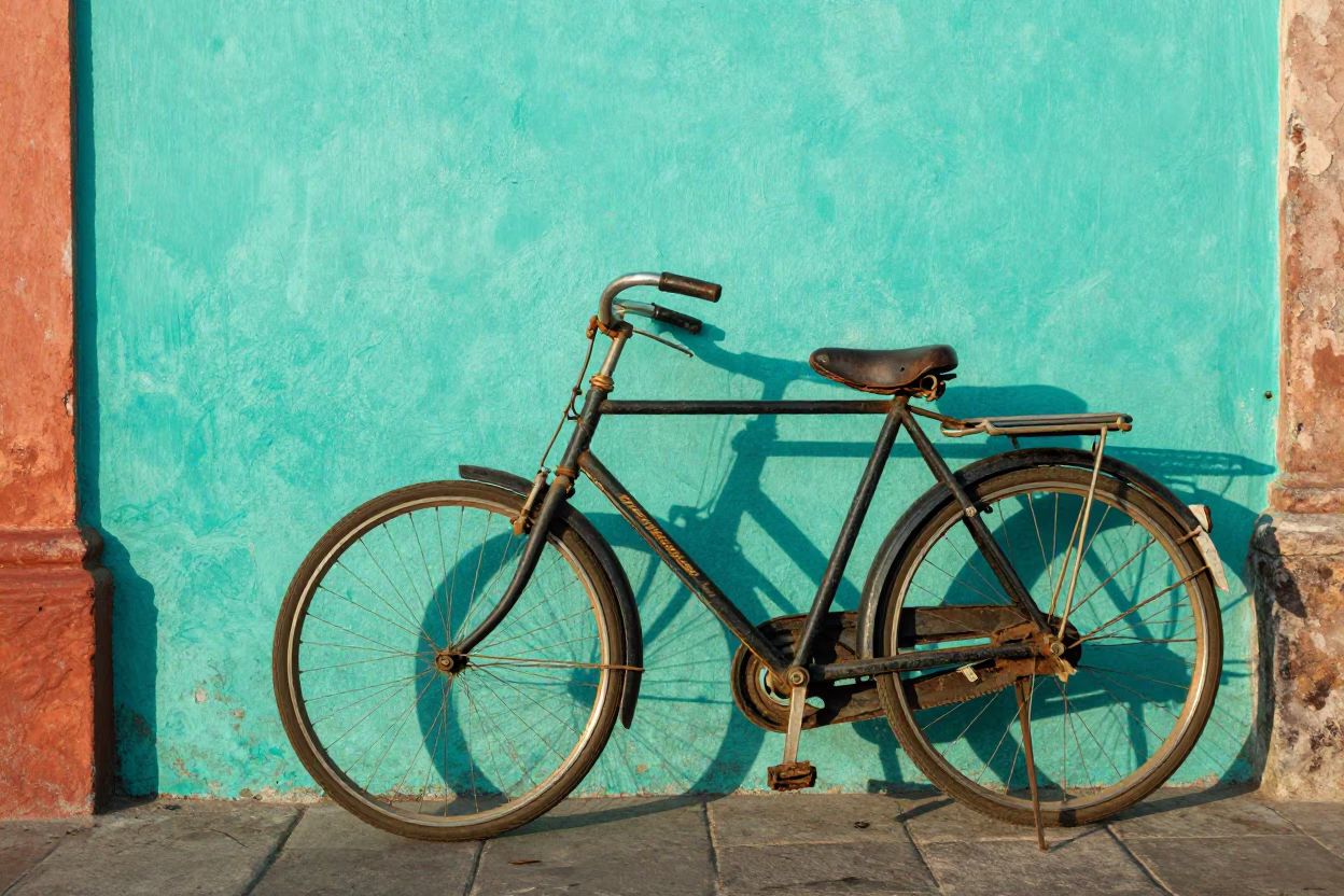 Vintage Bicycle Leaning Against Colorful Wall in Mexico City Late Afternoon Light in in Mexico City, Mexico