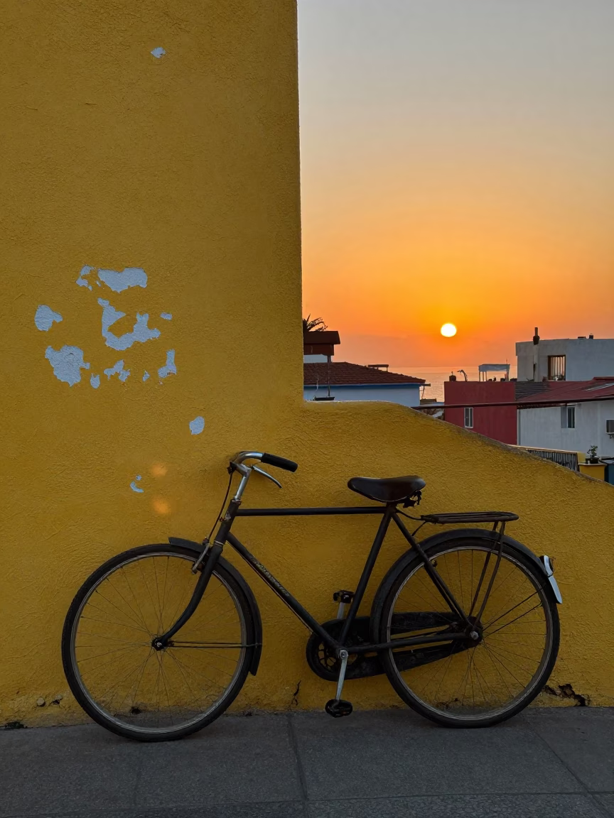 Vintage Bicycle Leaning Against Colorful Wall in Valparaiso Chile at Sunset in in Valparaiso, Chile