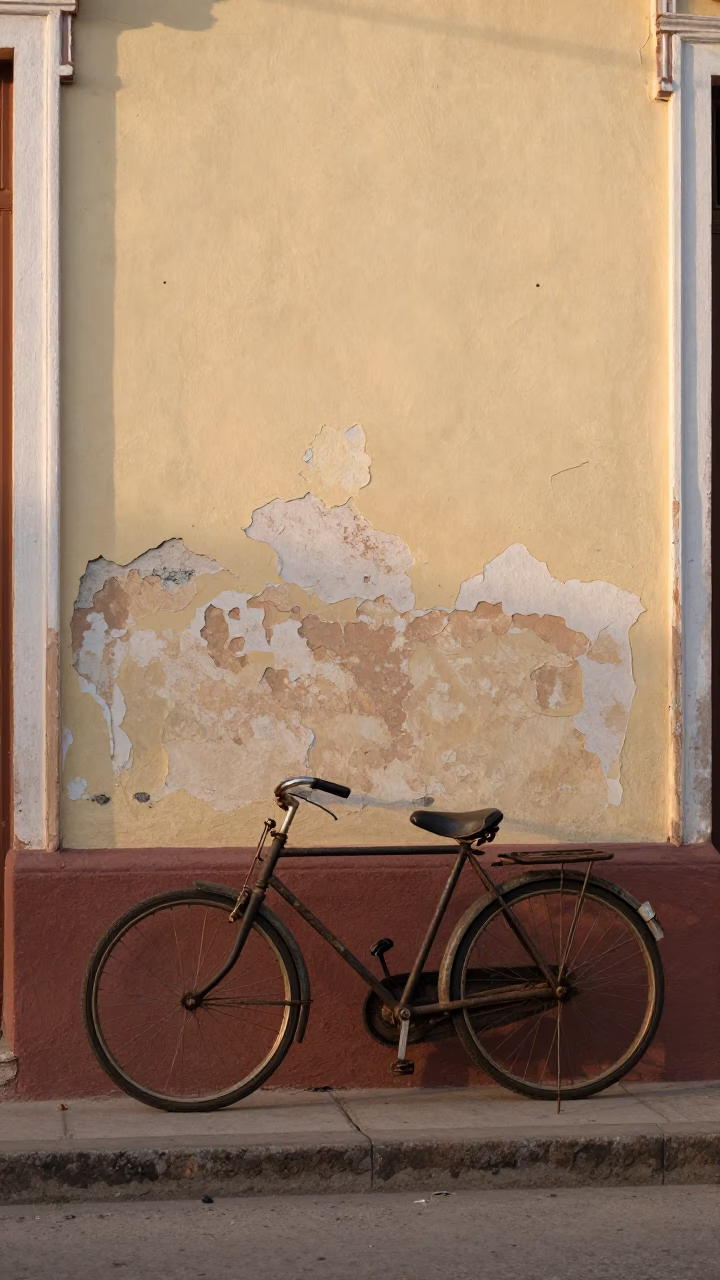 Vintage Bicycle Leaning Against Peeling Colonial Wall in Early Morning Havana Cuba in in Havana, Cuba