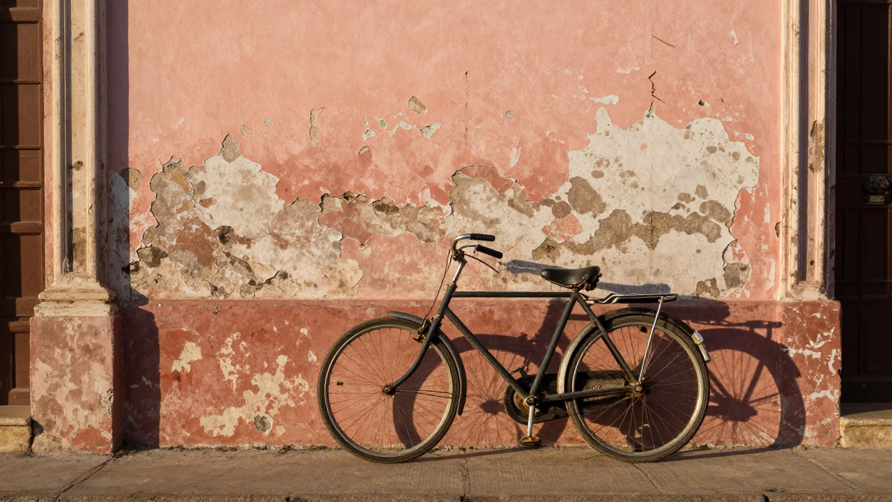 Vintage Bicycle Leaning Against Peeling Colonial Wall in Late Afternoon Havana Cuba in in Havana, Cuba