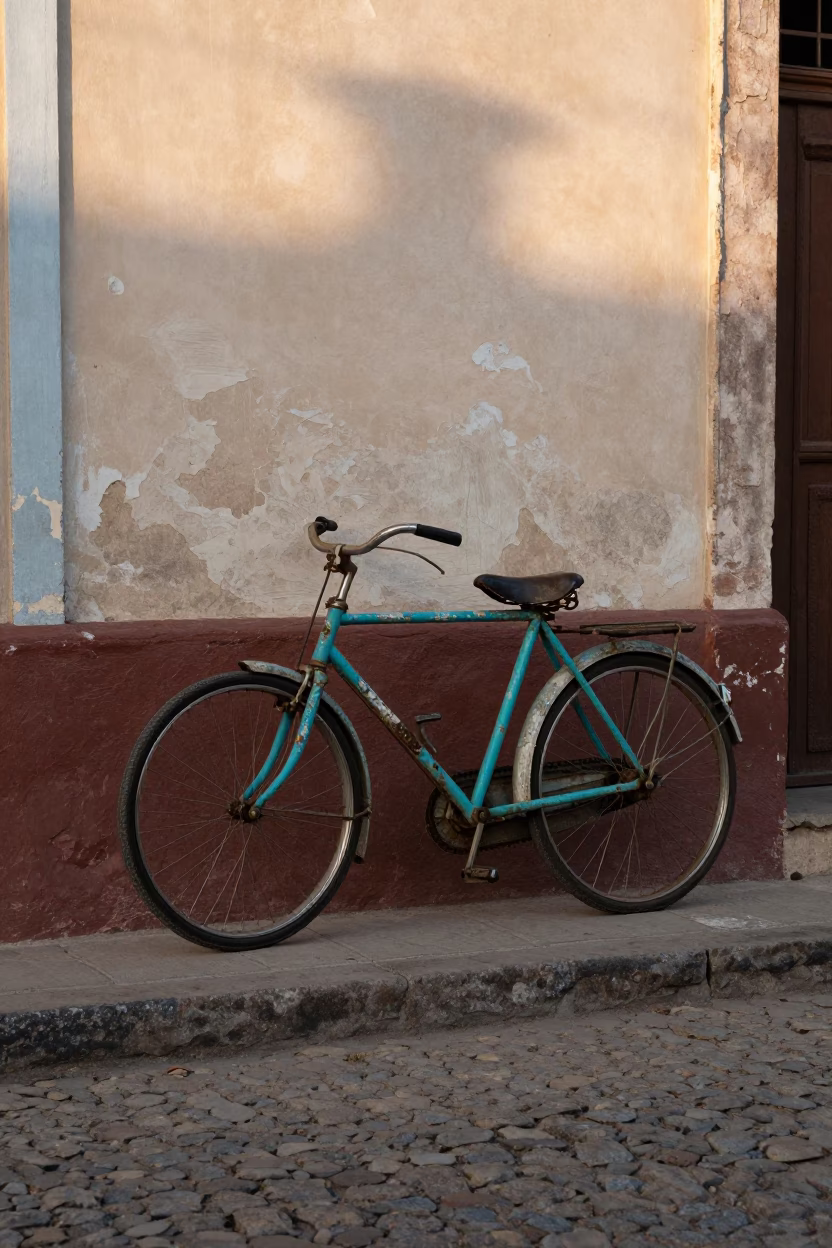 Vintage Bicycle Leaning Against Peeling Paint in Havana Cuba Early Evening Light in in Havana, Cuba