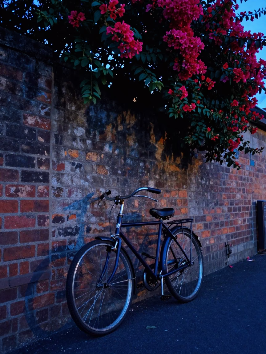 Vintage Bicycle Leaning Against Plumbago Hedge in Adelaide Evening Blue Light in in Adelaide, South Australia, Australia