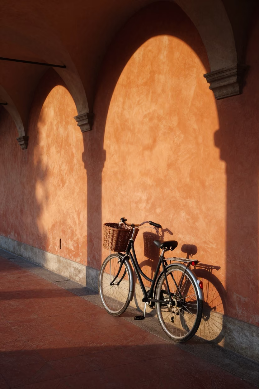 Vintage Bicycle Leaning Against Terracotta Wall in Bologna Italy After Sunrise in in Bologna, Italy
