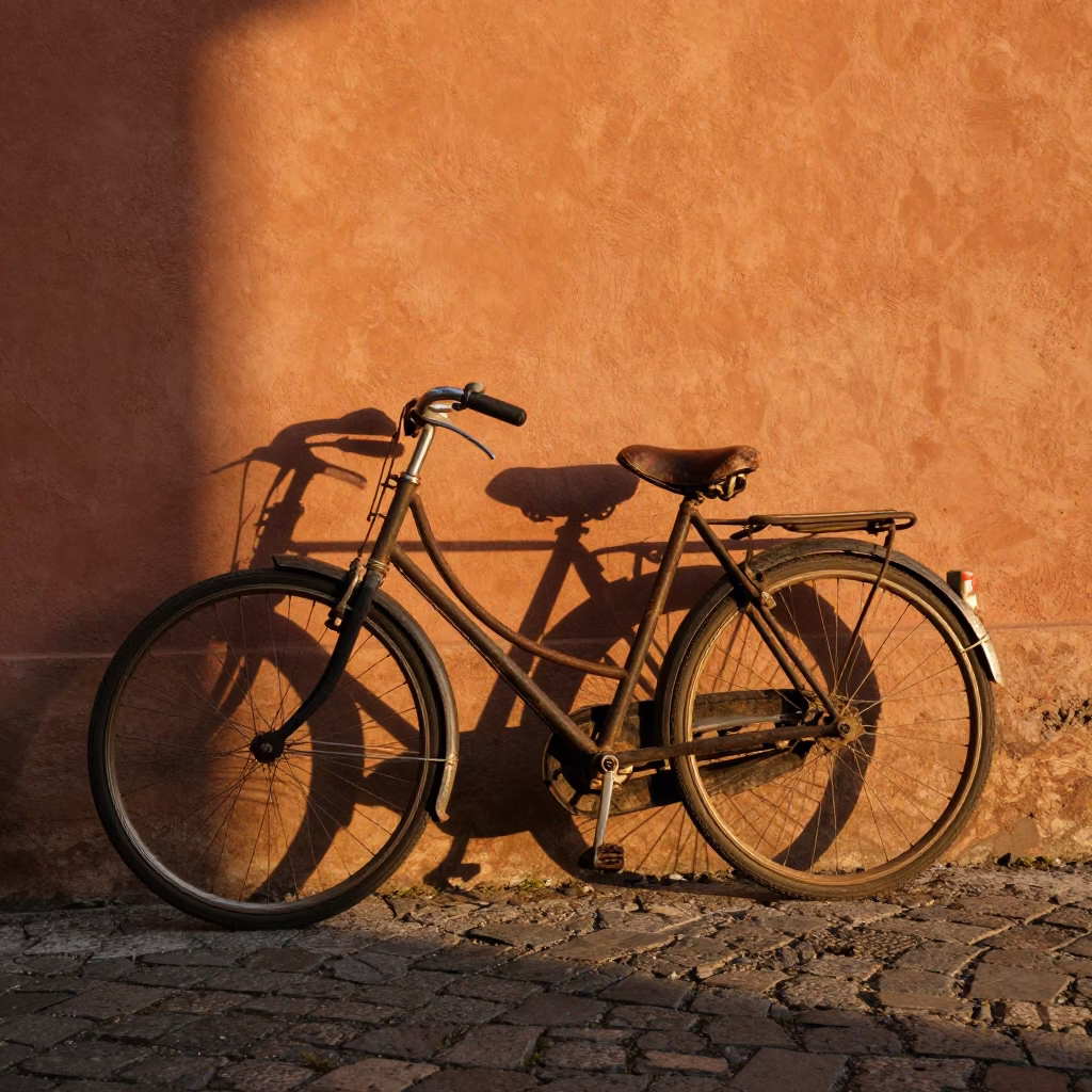Vintage Bicycle Leaning Against Terracotta Wall in Bologna Italy at Sunset in in Bologna, Italy