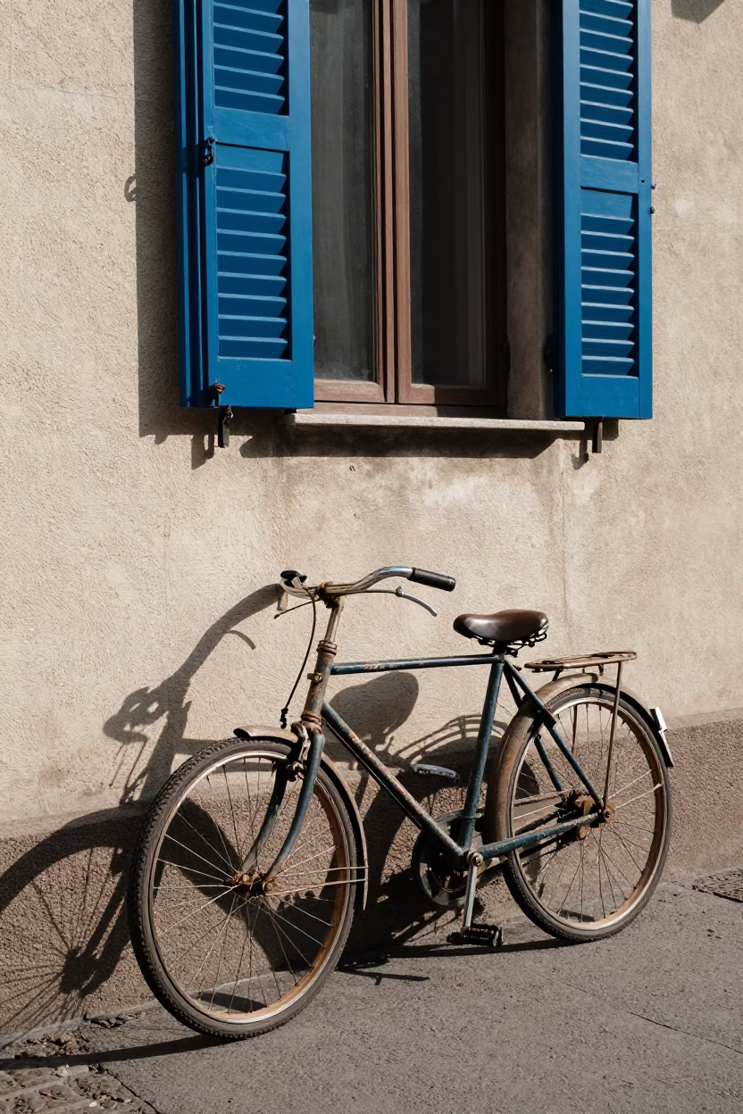 Vintage Bicycle Leaning Against Wall in Milan Italy Early Afternoon Street Scene in in Milan, Italy