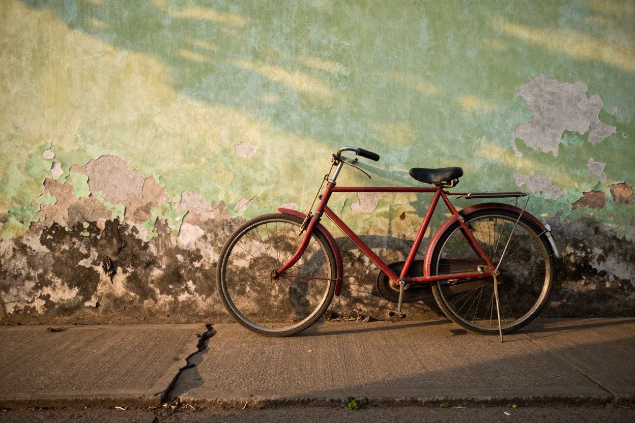 Vintage Bicycle Leaning Against Weathered Wall in Kochi India Early Morning Light in in Kochi, India