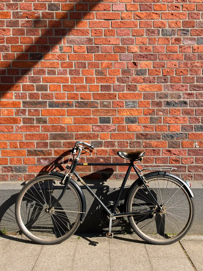 Vintage Bicycle Parked Against Brick Wall in Berlin Germany Bright Midmorning Light in in Berlin, Germany