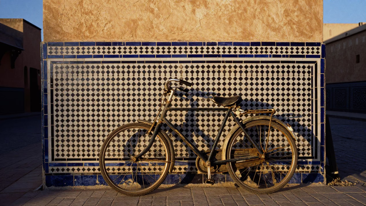 Vintage Bicycle Parked Against Zellige Tile Wall in Fez Morocco Blue Hour in in Fez, Morocco