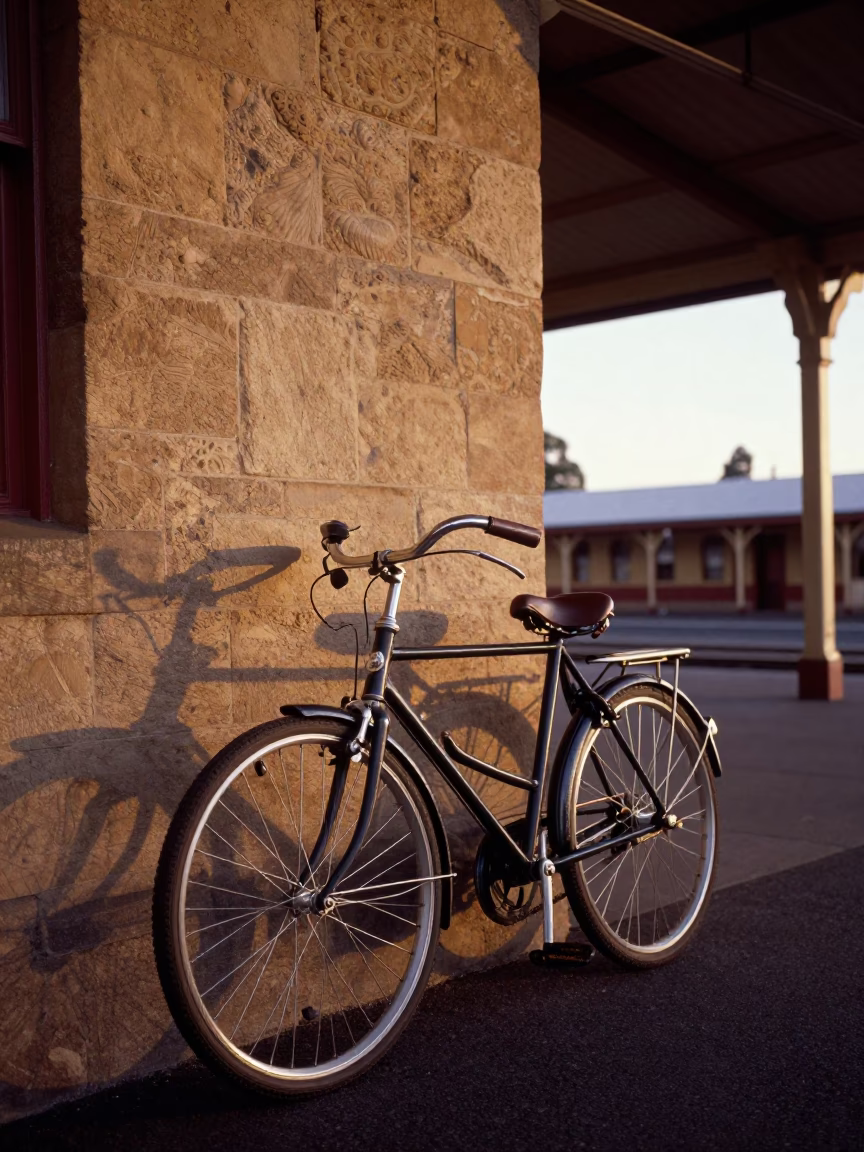 Vintage Bicycle Parked Outside Historic Adelaide Railway Station at Sunset in in Adelaide, South Australia, Australia