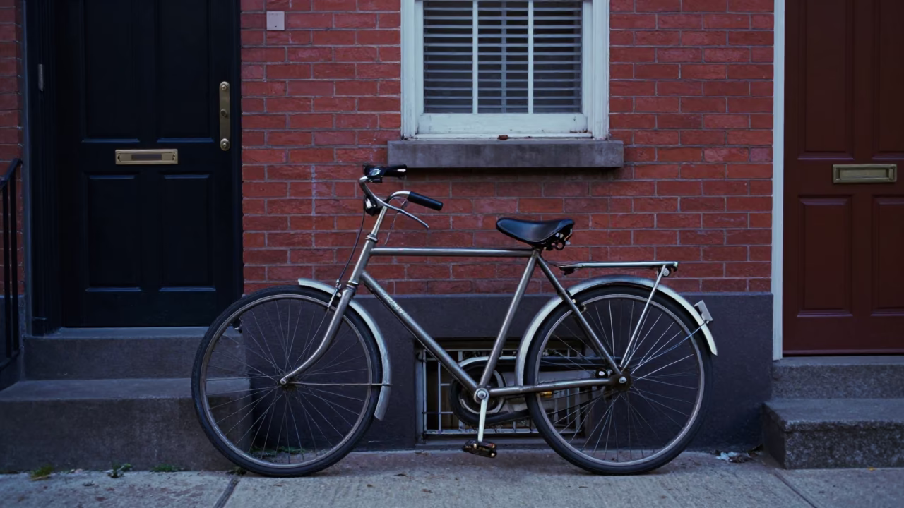 Vintage Bicycle Parked Outside Historic Philadelphia Row House in Evening Blue Light in in Philadelphia, Pennsylvania, United States