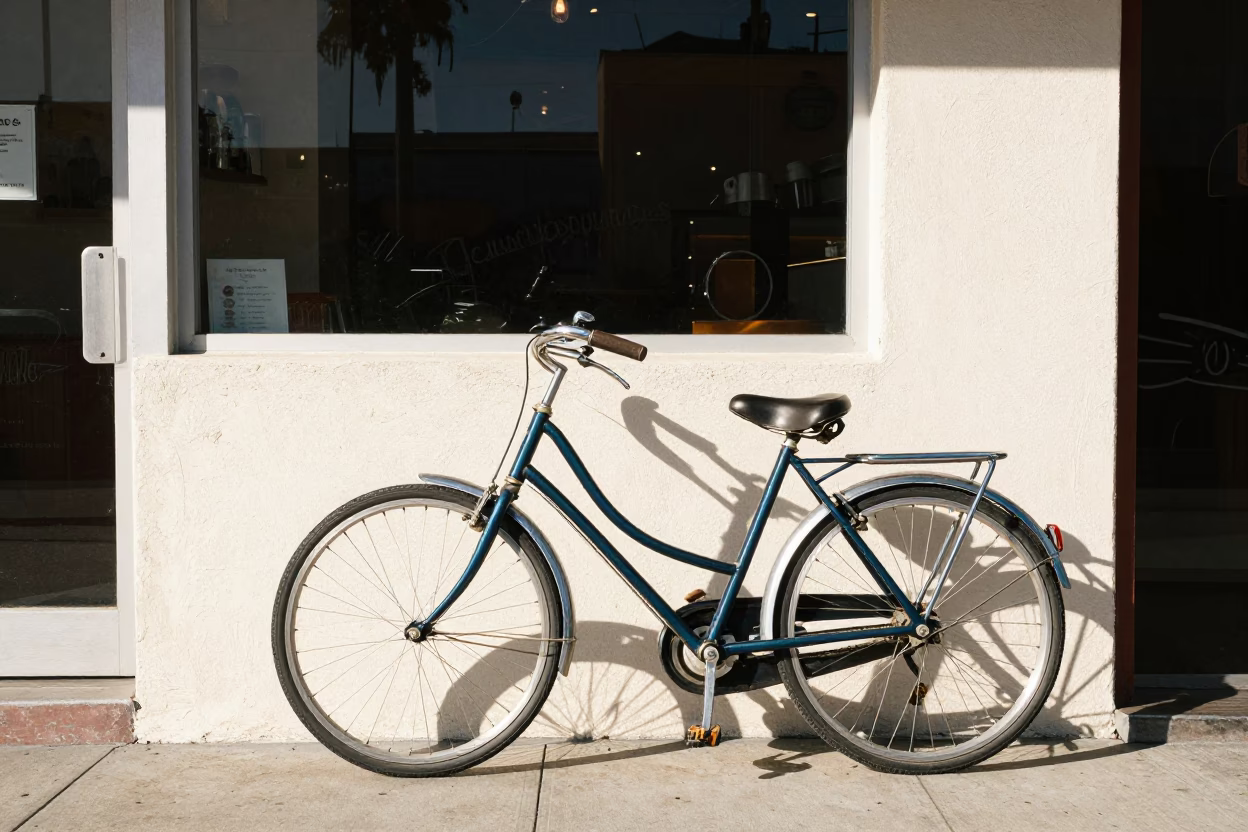 Vintage Bicycle Parked Outside LA Cafe With Sugar Jar and Hammer on Table in in Los Angeles, California, United States