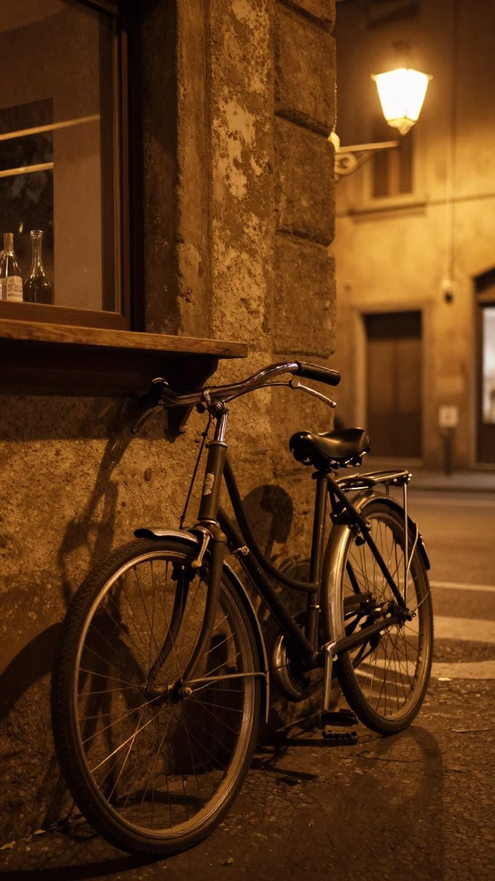 Vintage Bicycle Parked Outside Milan Bar at Midnight with Street Signage in in Milan, Italy
