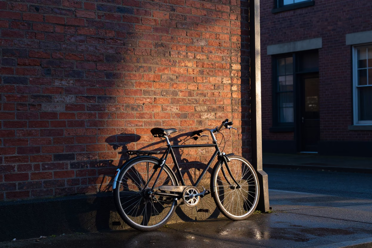 Vintage Bicycle Propped Against Brick Bakery Wall in Portland Oregon at Dawn in in Portland, Oregon, United States