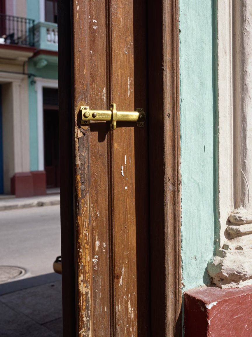 Vintage Havana Street Scene with Latch Detail and Local Architecture at Midday in in Havana, Cuba