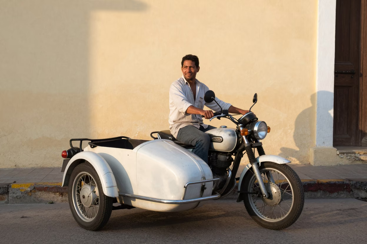 Vintage Motorcycle Sidecar Driver Smiling in Cartagena Colombia Morning Light in in Cartagena, Colombia
