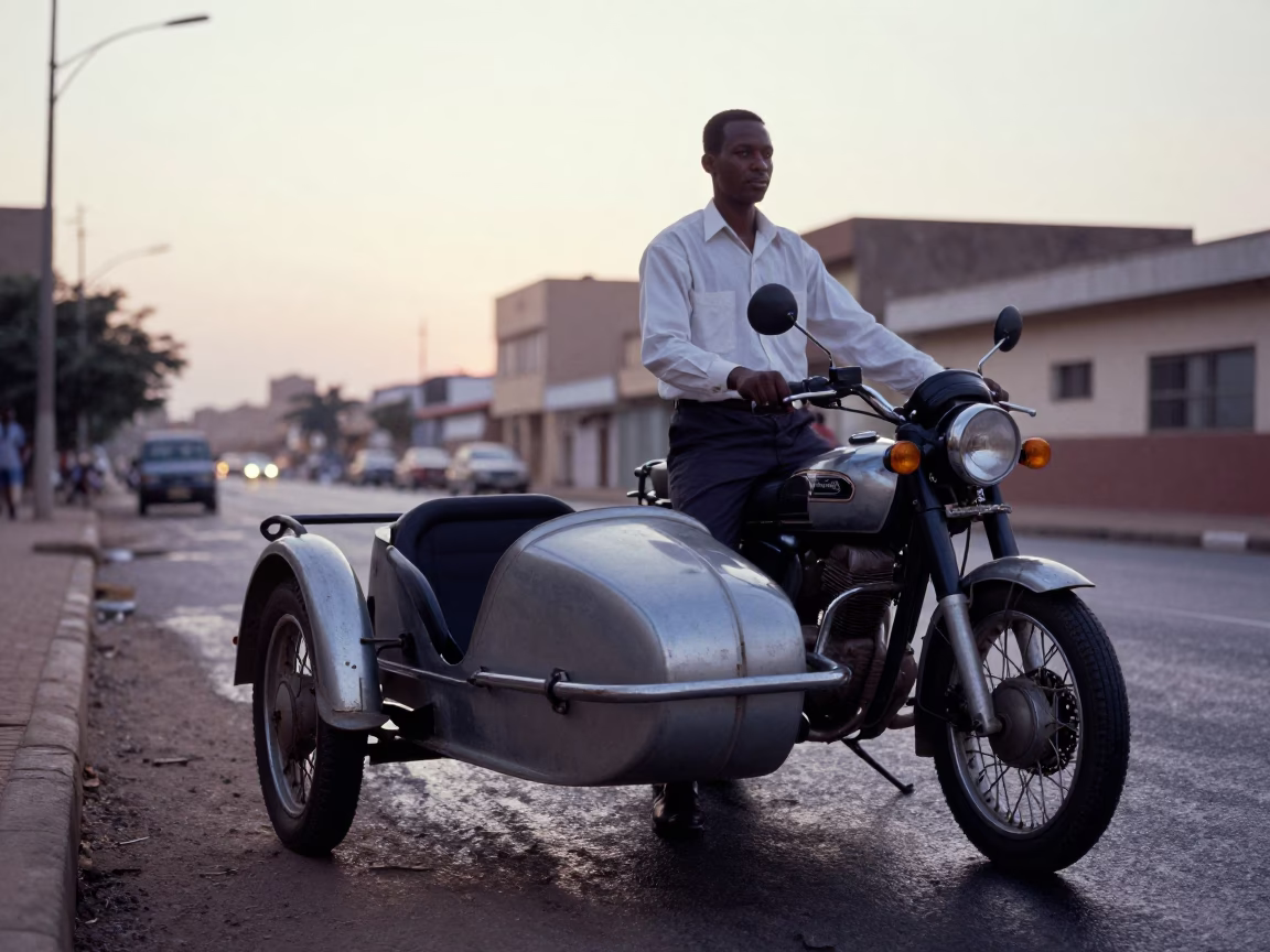 Vintage Motorcycle Sidecar Driver Waiting Before Sunrise in Dakar Senegal Street Scene in in Dakar, Senegal