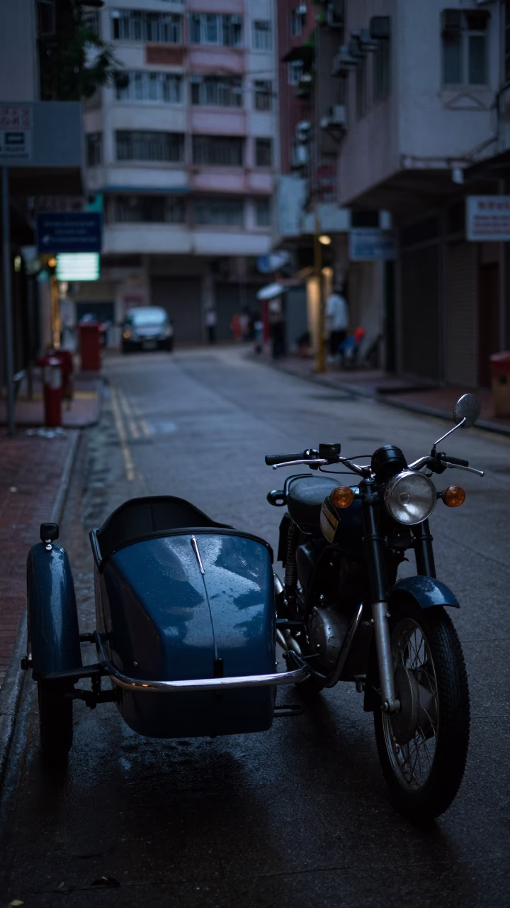 Vintage Motorcycle with Sidecar in Predawn Hong Kong Street in in Hong Kong, Hong Kong