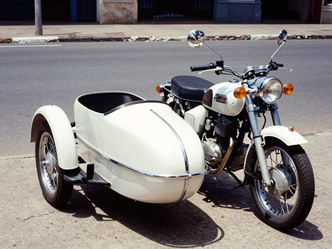 Vintage Motorcycle with Sidecar Parked on Durban Street Under Midday Sun in in Durban, South Africa