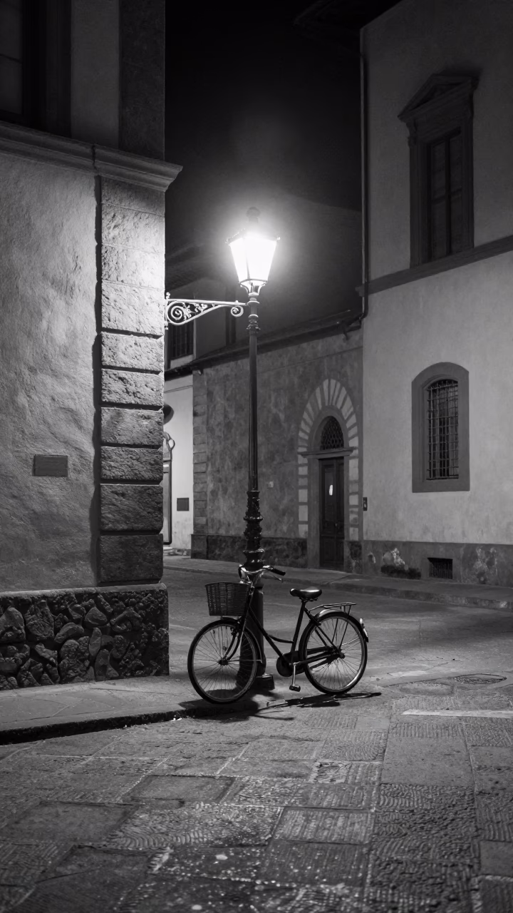 Vintage Night Scene in Florence Italy with Bicycle and Street Lamp in in Florence, Italy