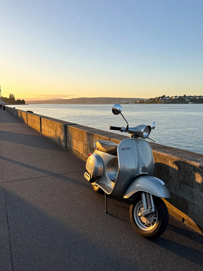 Vintage Scooter Parked on Christchurch Harbor Promenade at Sunset in in Christchurch, New Zealand