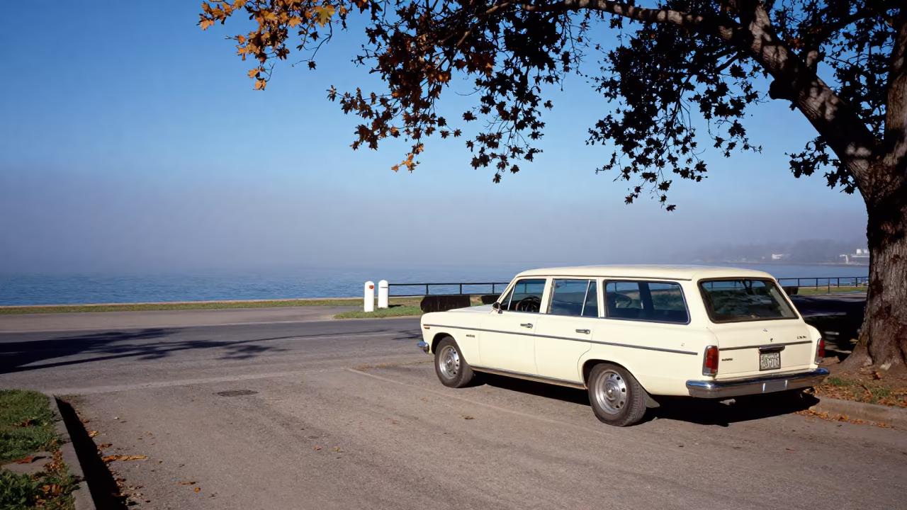 Vintage Station Wagon at Foggy Harbor Manta Entrance in beside a fogbound harbor mouth near Manta