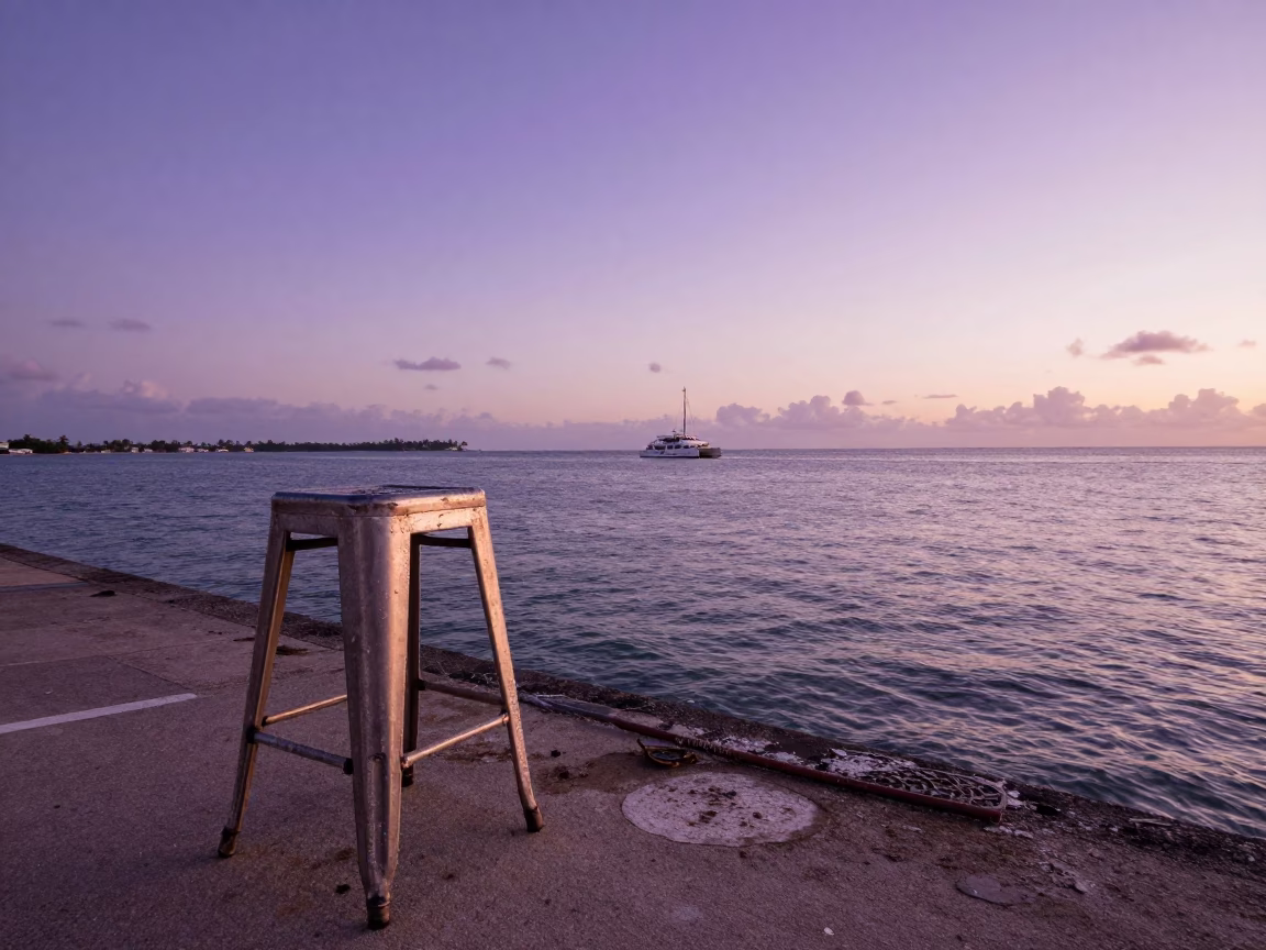 Vintage Sunset at Miami Beach Pier with Condensation on Metal Stool and Glass Tumblers in in Miami, Florida, United States