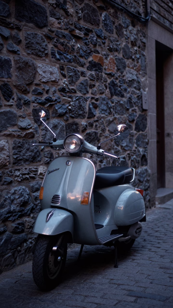 Vintage Vespa on Cobblestone Lane in Montreal Quebec Before Sunrise in in Montreal, Quebec, Canada