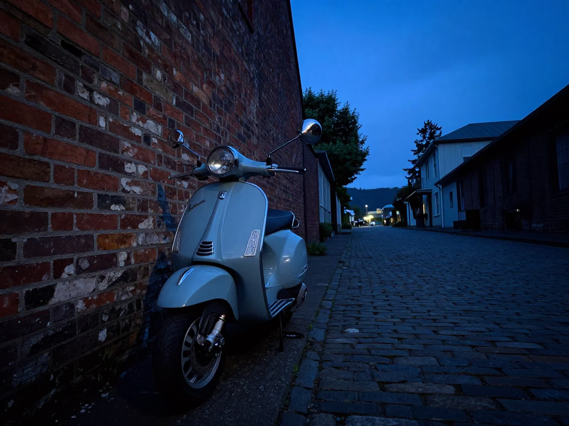 Vintage Vespa on Cobblestone Lane in Portland Oregon Indigo Twilight in in Portland, Oregon, United States