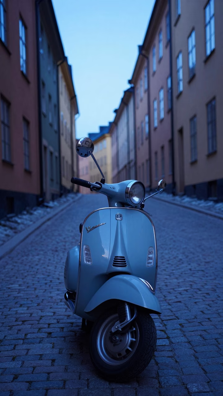 Vintage Vespa on Cobblestone Lane in Stockholm Sweden Under Evening Blue Light in in Stockholm, Sweden